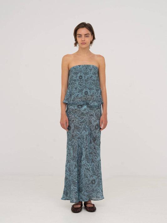 Top a fascia blu con stampa celestiale