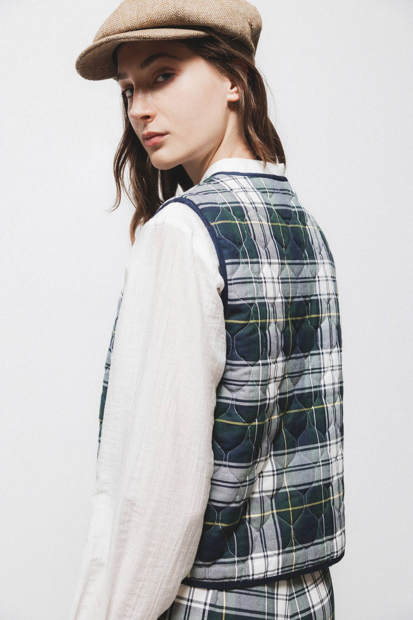 Gilet trapuntato tartan con scollo a V