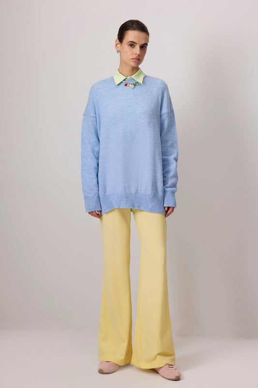 Pantaloni a zampa a vita alta giallo pastello con zip laterale