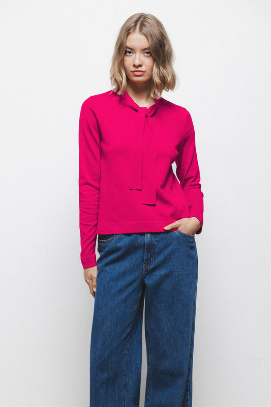 Maglione in maglia rasata con fiocco e scollo a V