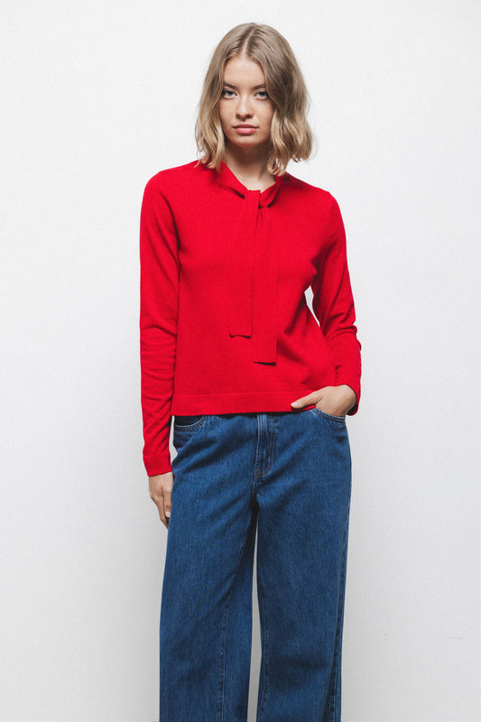 Maglione in maglia rasata con scollo a V e fiocco
