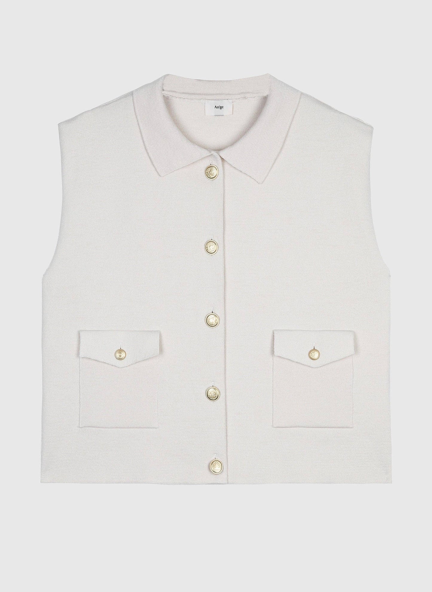 Cardigan smanicato bianco in maglia con bottoni