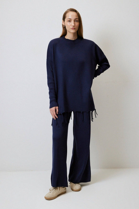 Set maglia e pantaloni con frange