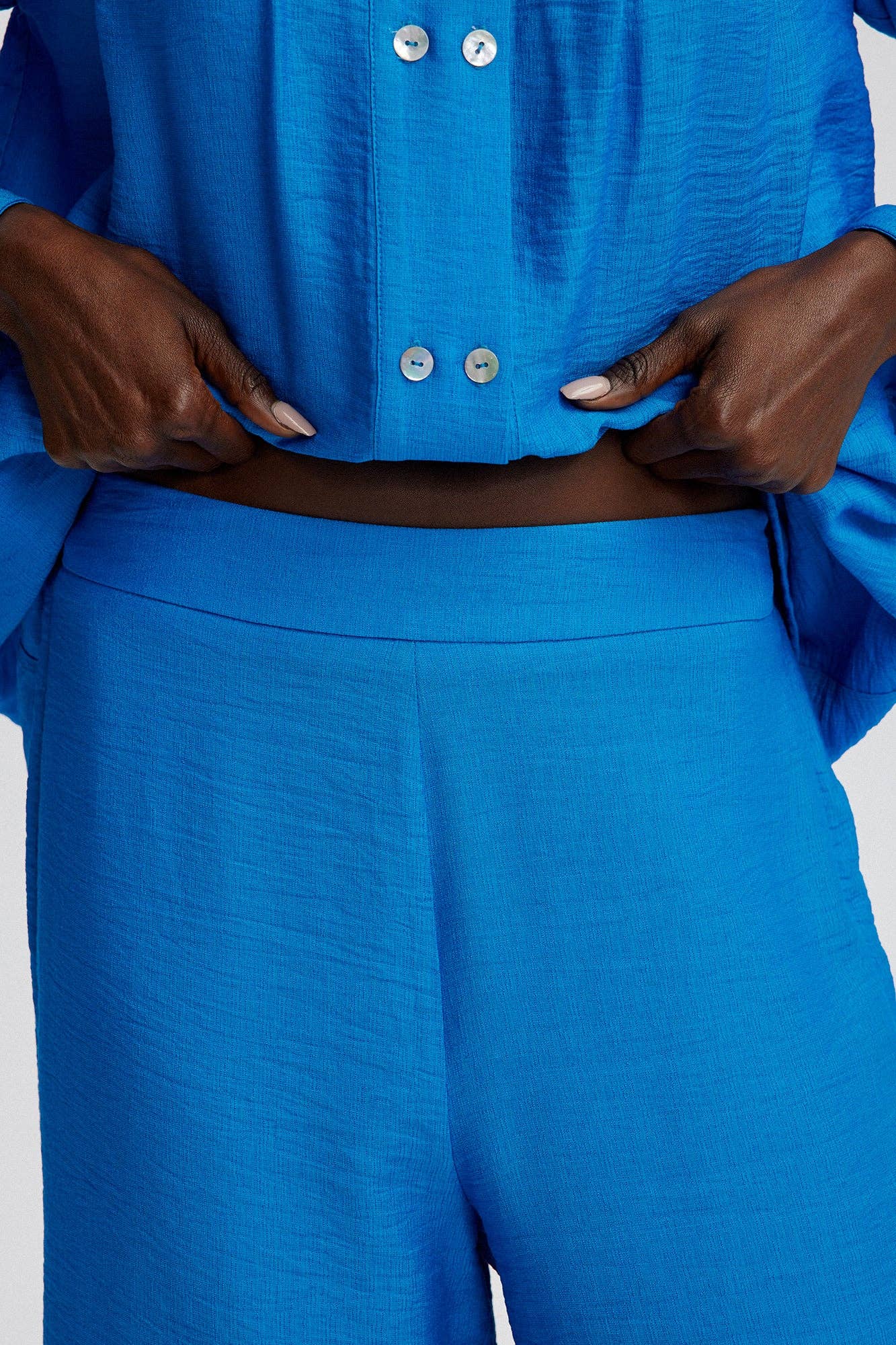 Completo tunica e pantaloni blu in tessuto naturale