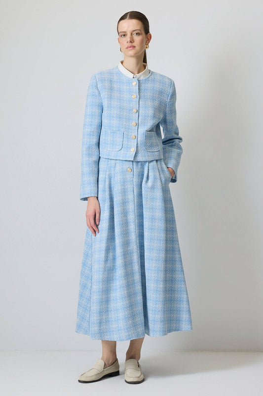 Completo in tweed di cotone con giacca corta e gonna midi