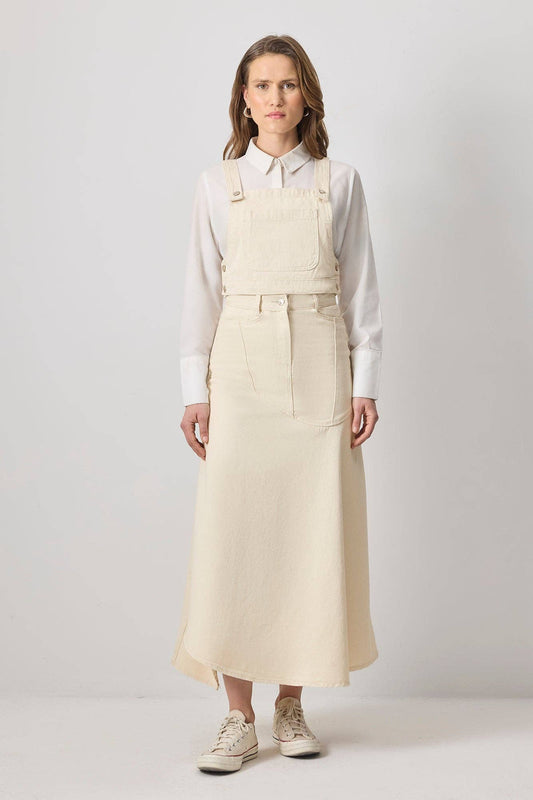 Top crop in denim ecrù con bretelle