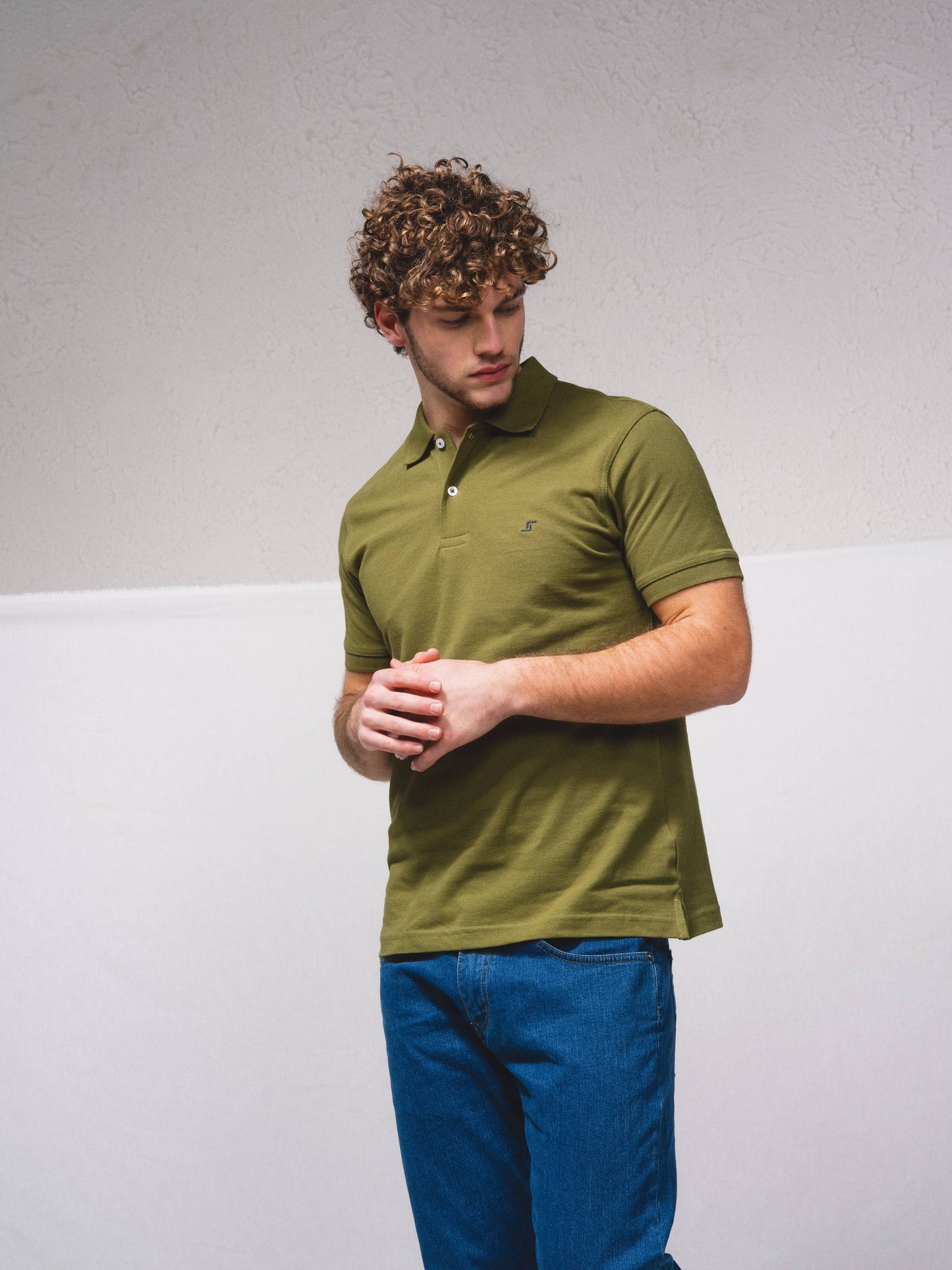 Polo piqué in cotone con ricamo