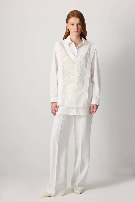 Maglia stratificata in pizzo con scollo a V