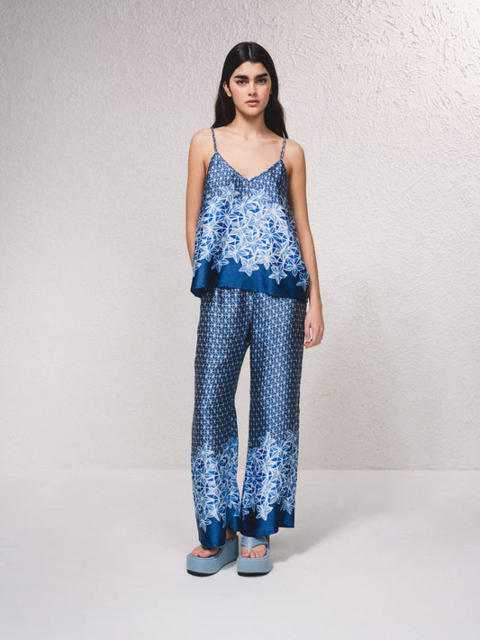 Pantaloni ampi in raso stampato blu