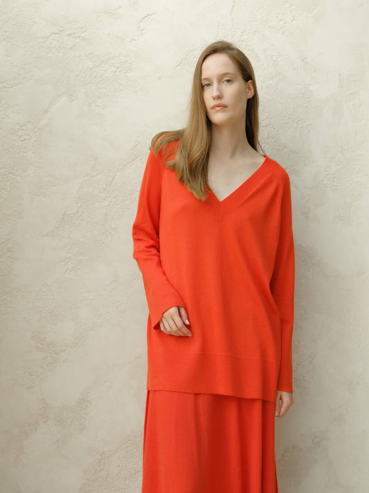 Maxi maglione in lana merino extra fine con scollo a V