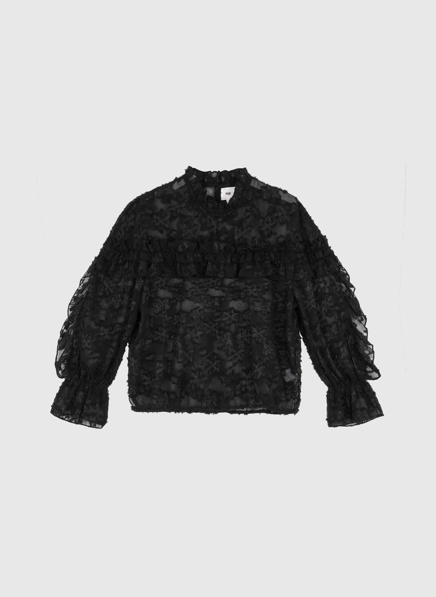 Blusa trasparente jacquard con volant