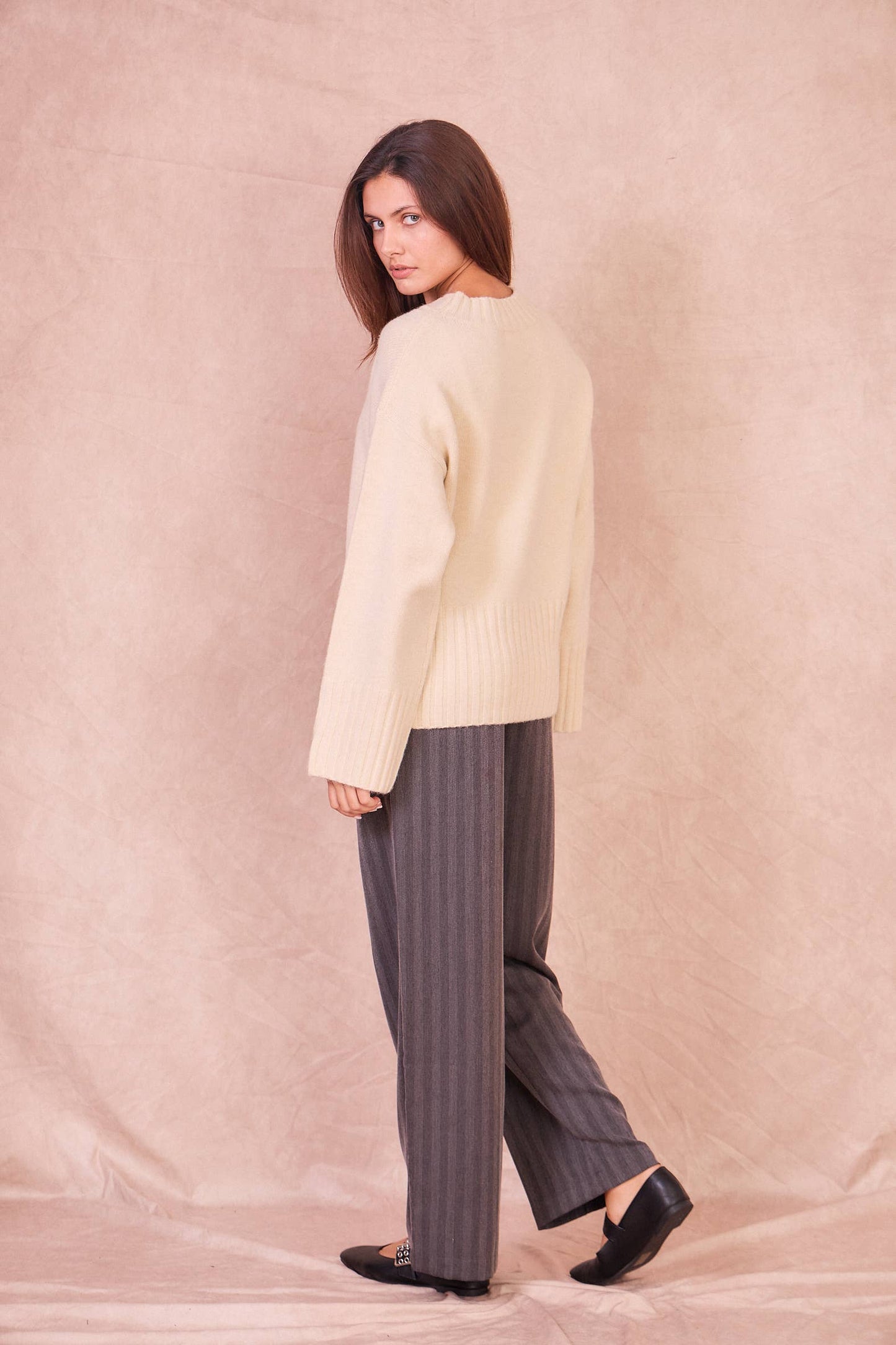 Maglione in misto lana con bottoni laterali