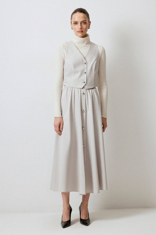Completo gilet e gonna midi gessata
