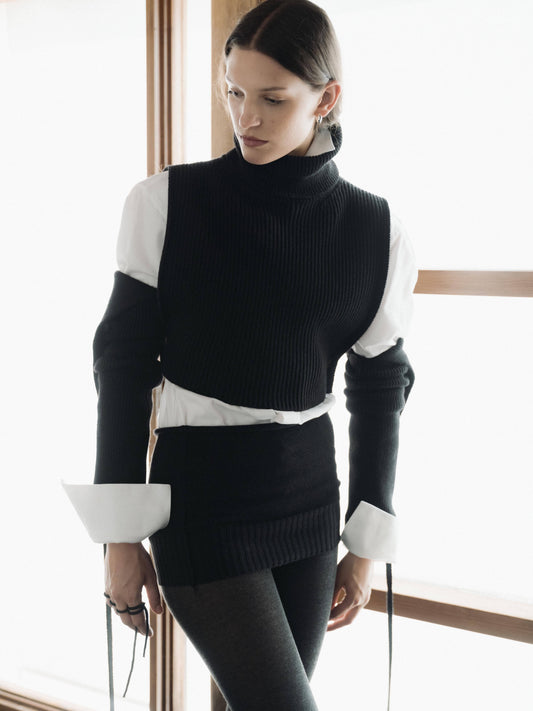 Scaldabraccia in lana merino extra fine con fasce lunghe