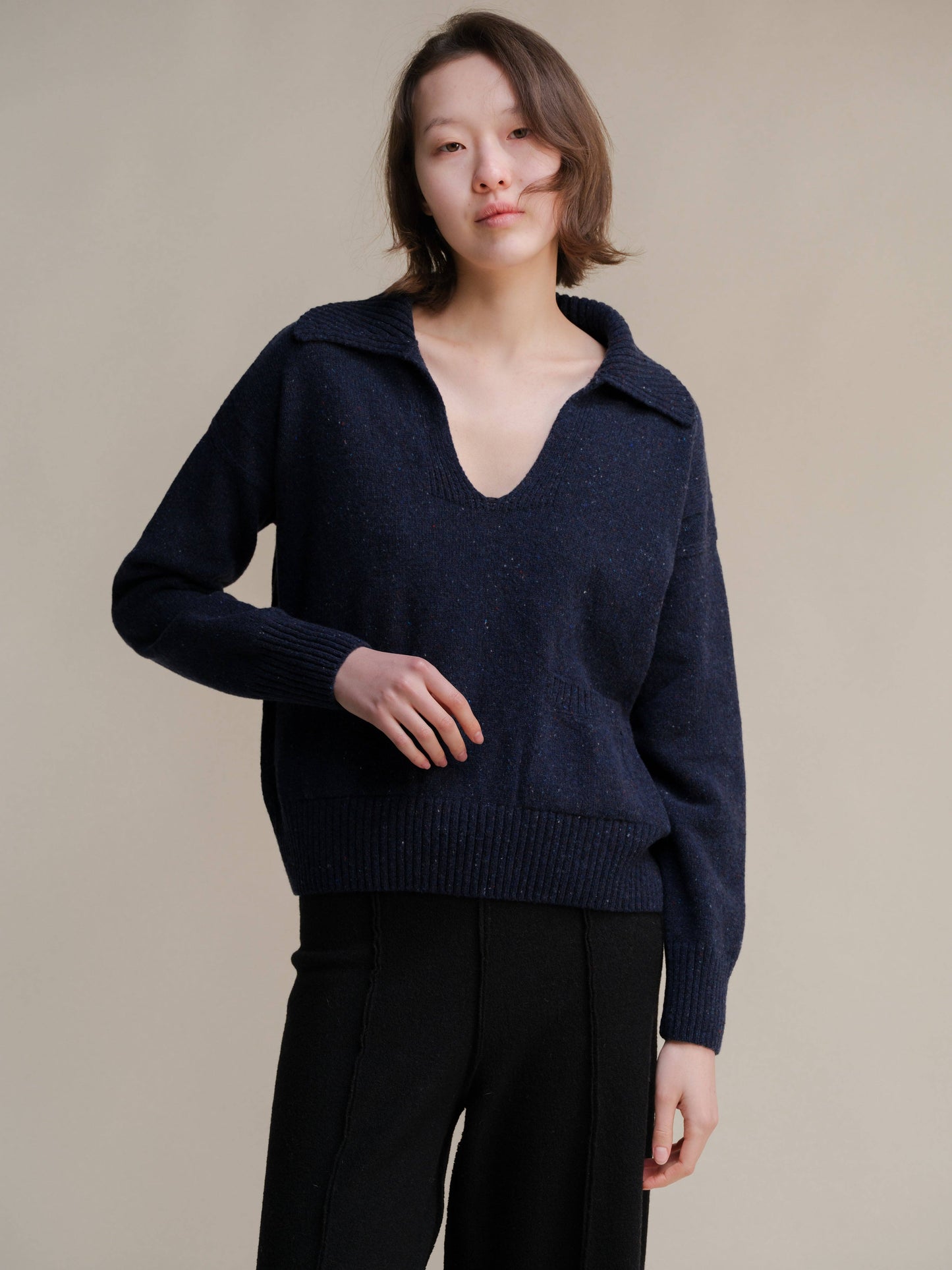 Polo oversize in tweed con tasche