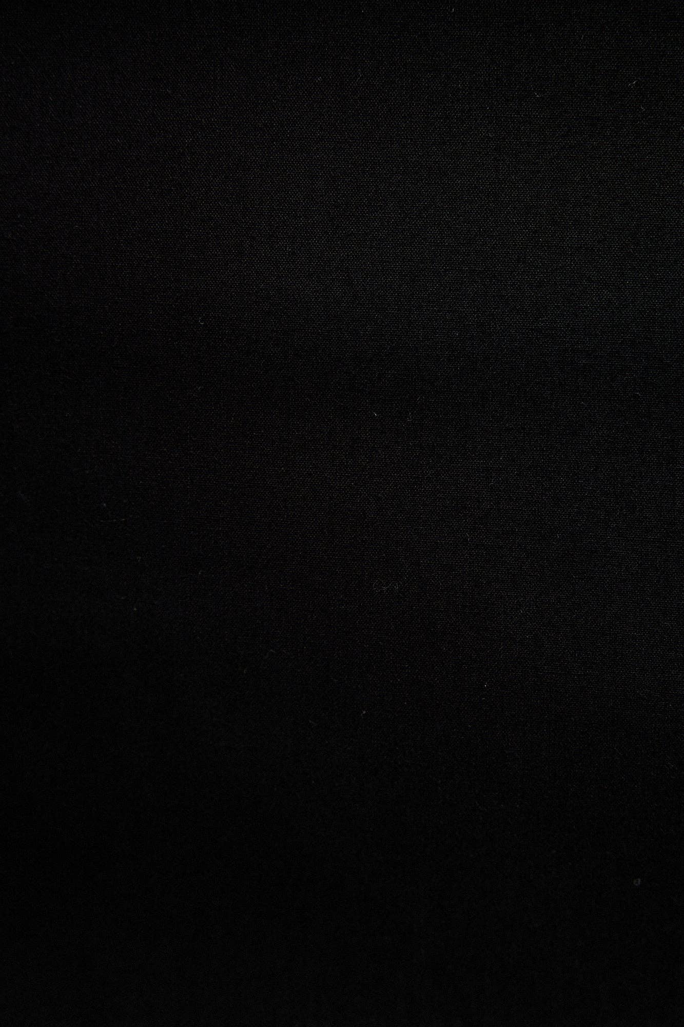 Camicia nera in popeline con polsini ampi e applicazioni stella marina
