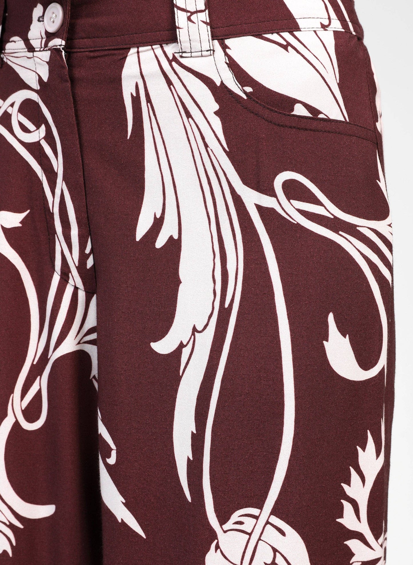 Pantaloni a palazzo bordeaux con stampa floreale