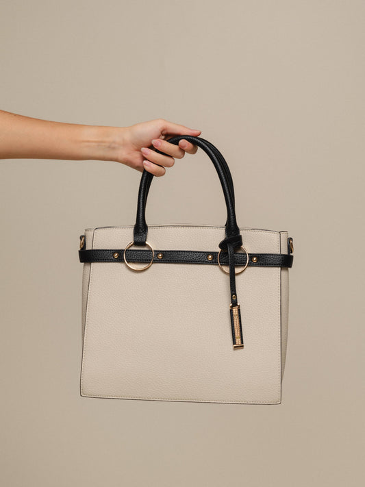 Borsa a mano in ecopelle con dettagli metallici