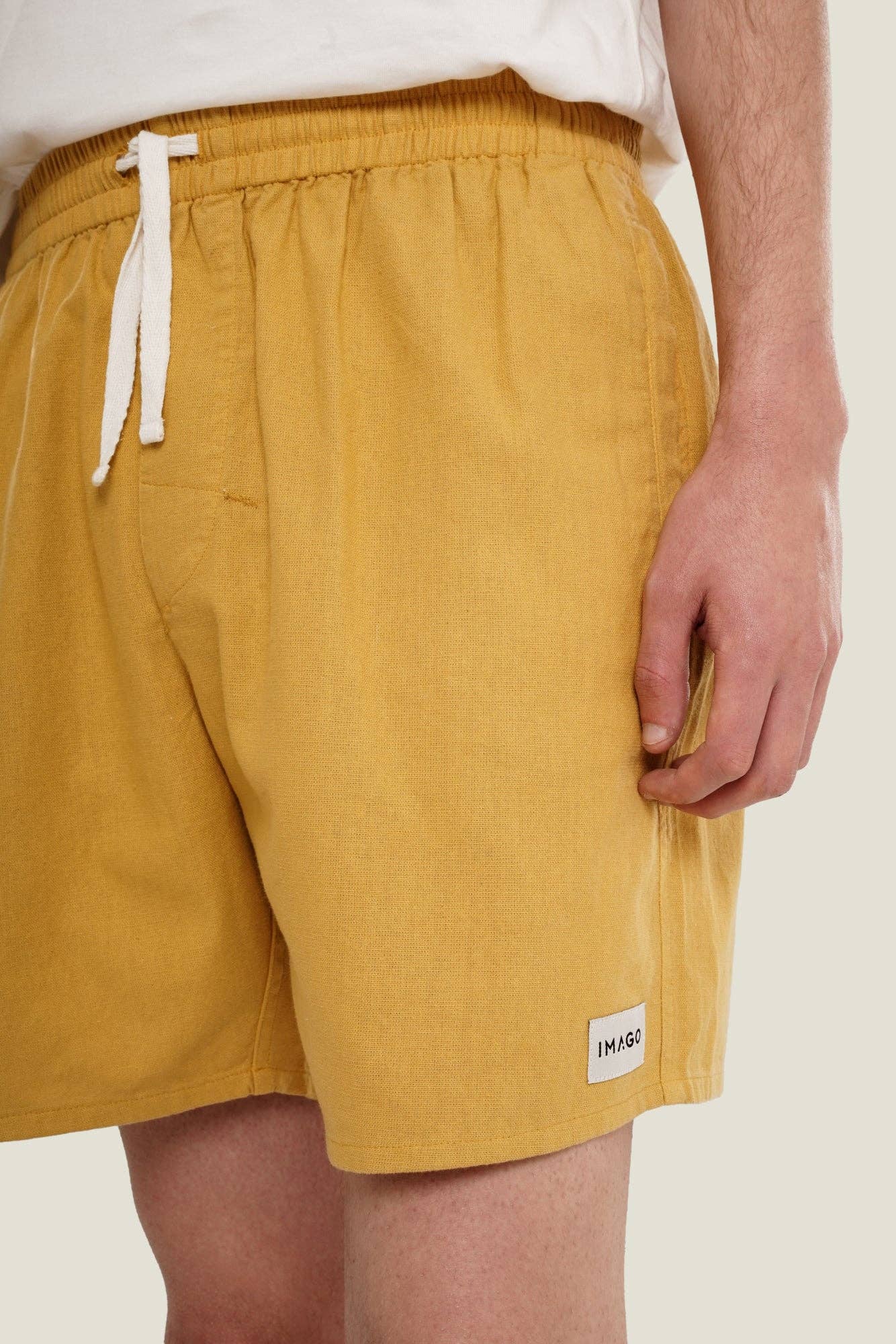 Short in lino oro unisex