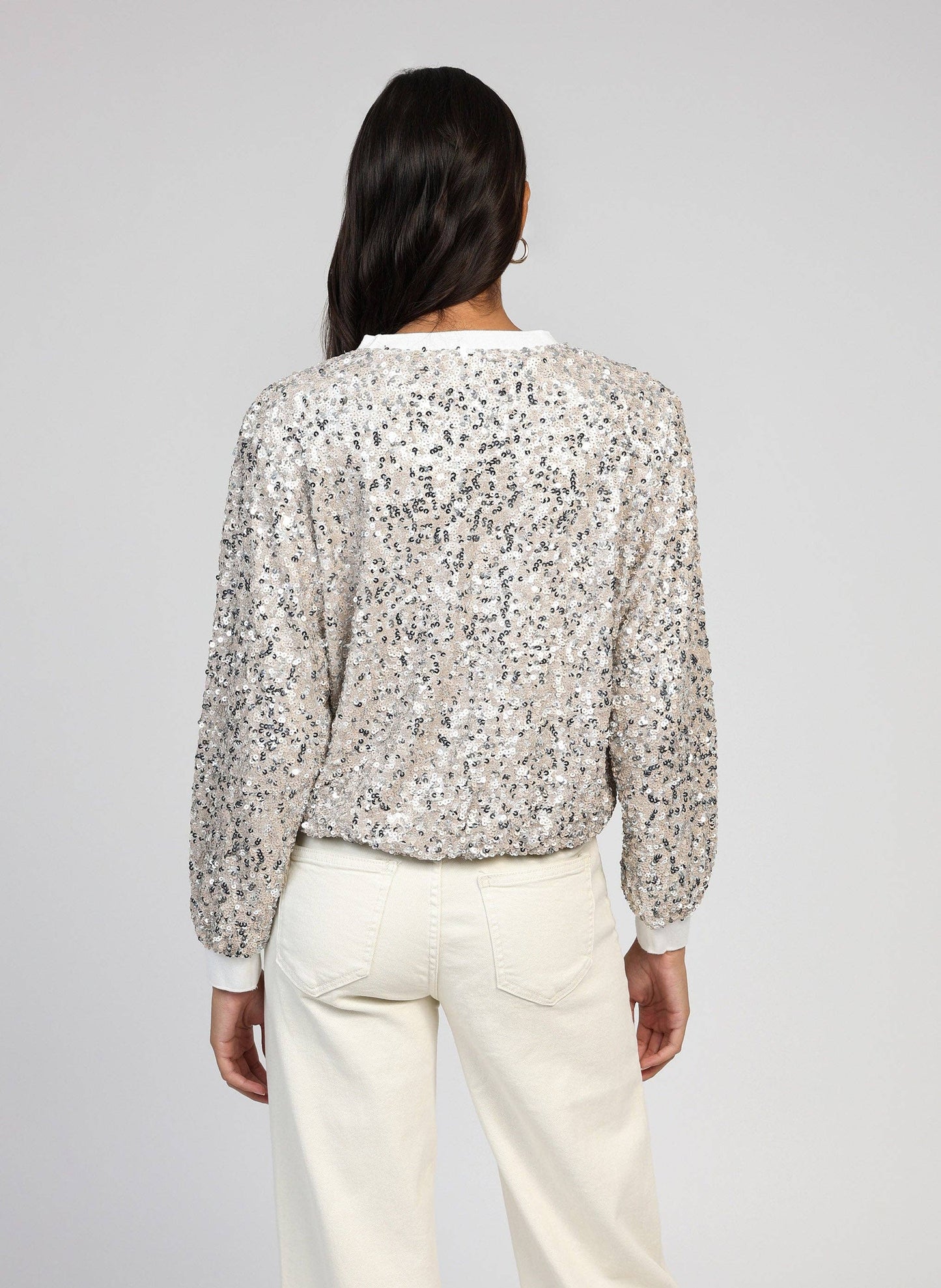 Maglione tricot con paillettes effetto glow