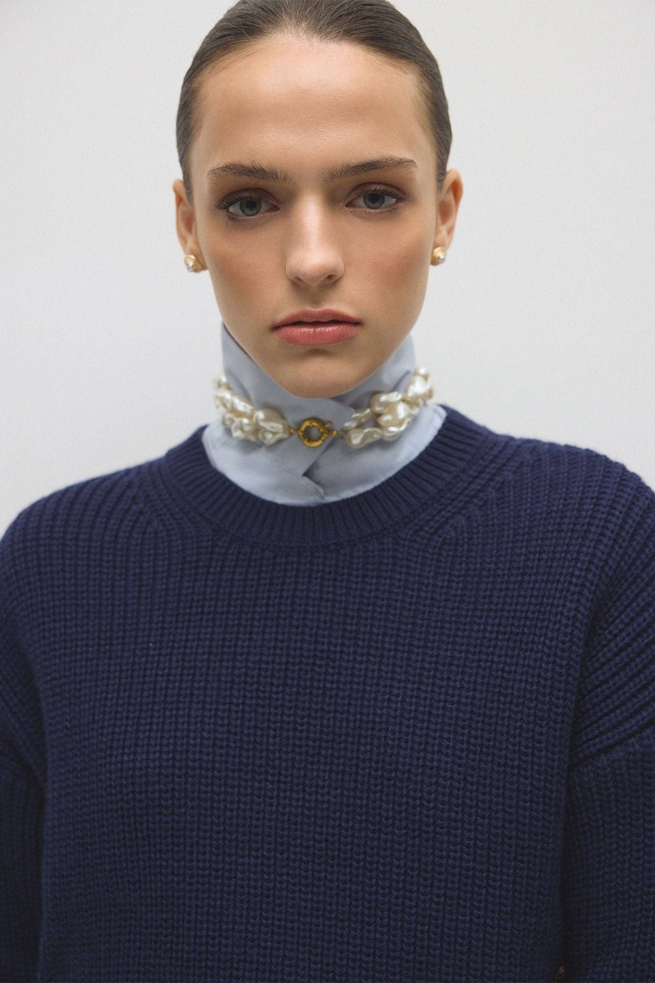 Maglione navy a righe con bottoni dorati