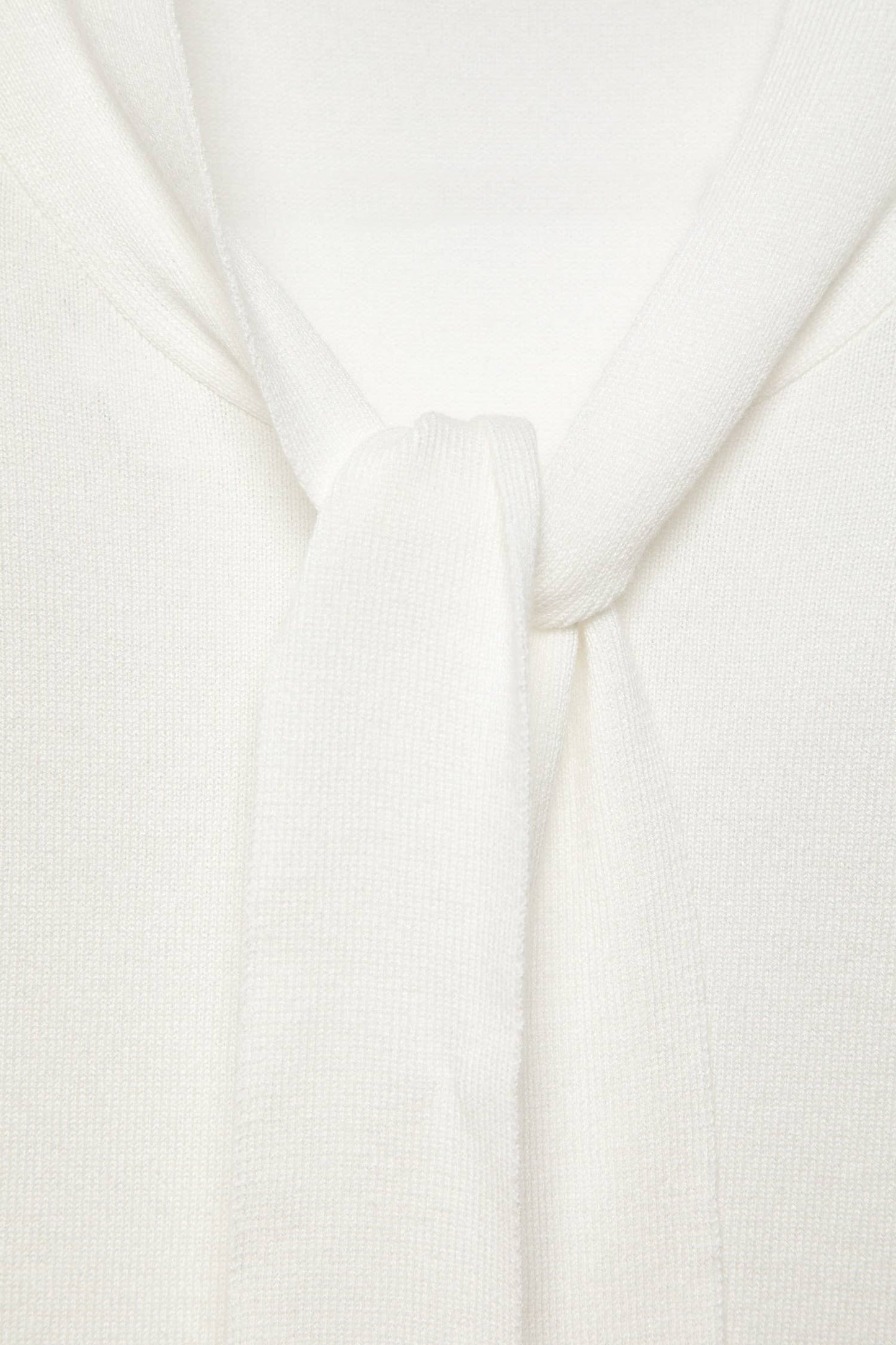 Maglione in maglia rasata con scollo a V e fiocco