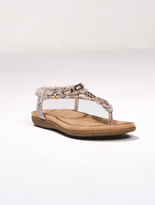 Sandali flat animalier con applicazioni metalliche