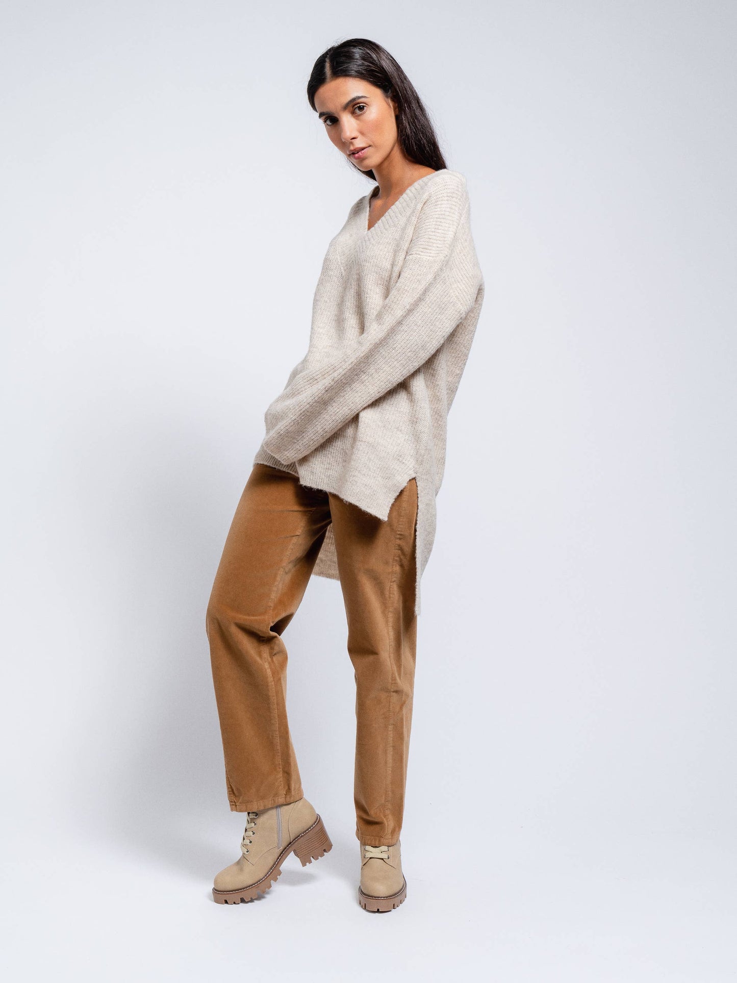Maglione tunica da donna con scollo a V