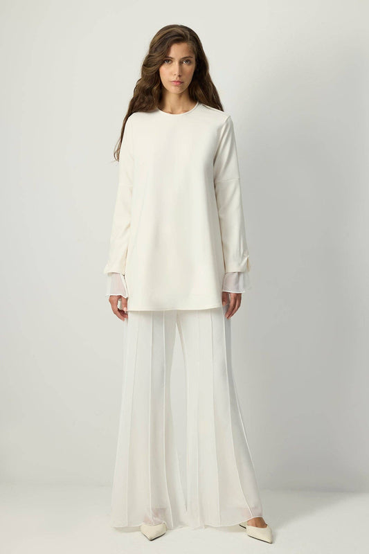 Tunica in crêpe con polsini in chiffon trasparente