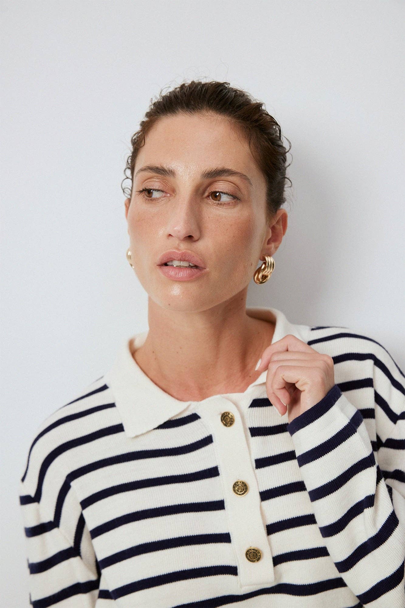 Maglione a righe con colletto polo
