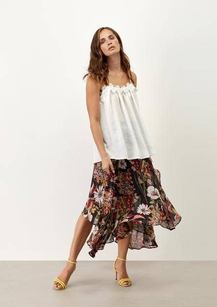 Top bianco in pizzo con spalline sottili