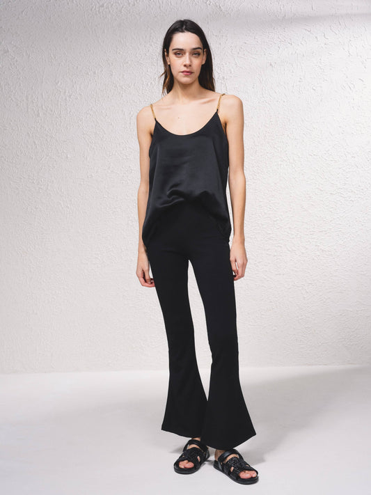 Pantaloni a zampa in rete con vita elasticizzata