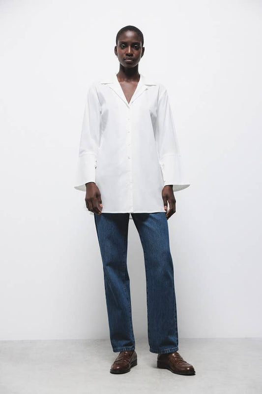 Camicia bianca con fiocchi ai polsini