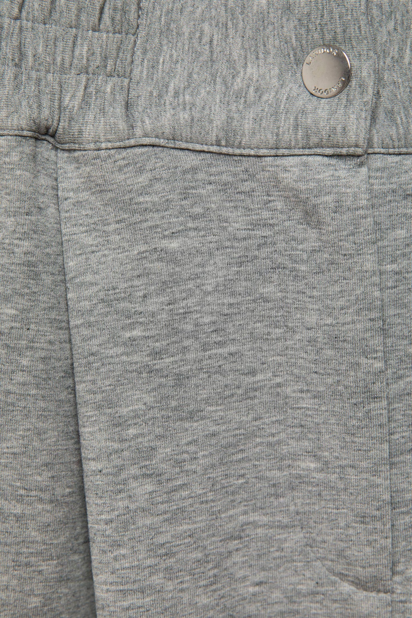 Pantaloni a palazzo con pieghe e vita elasticizzata