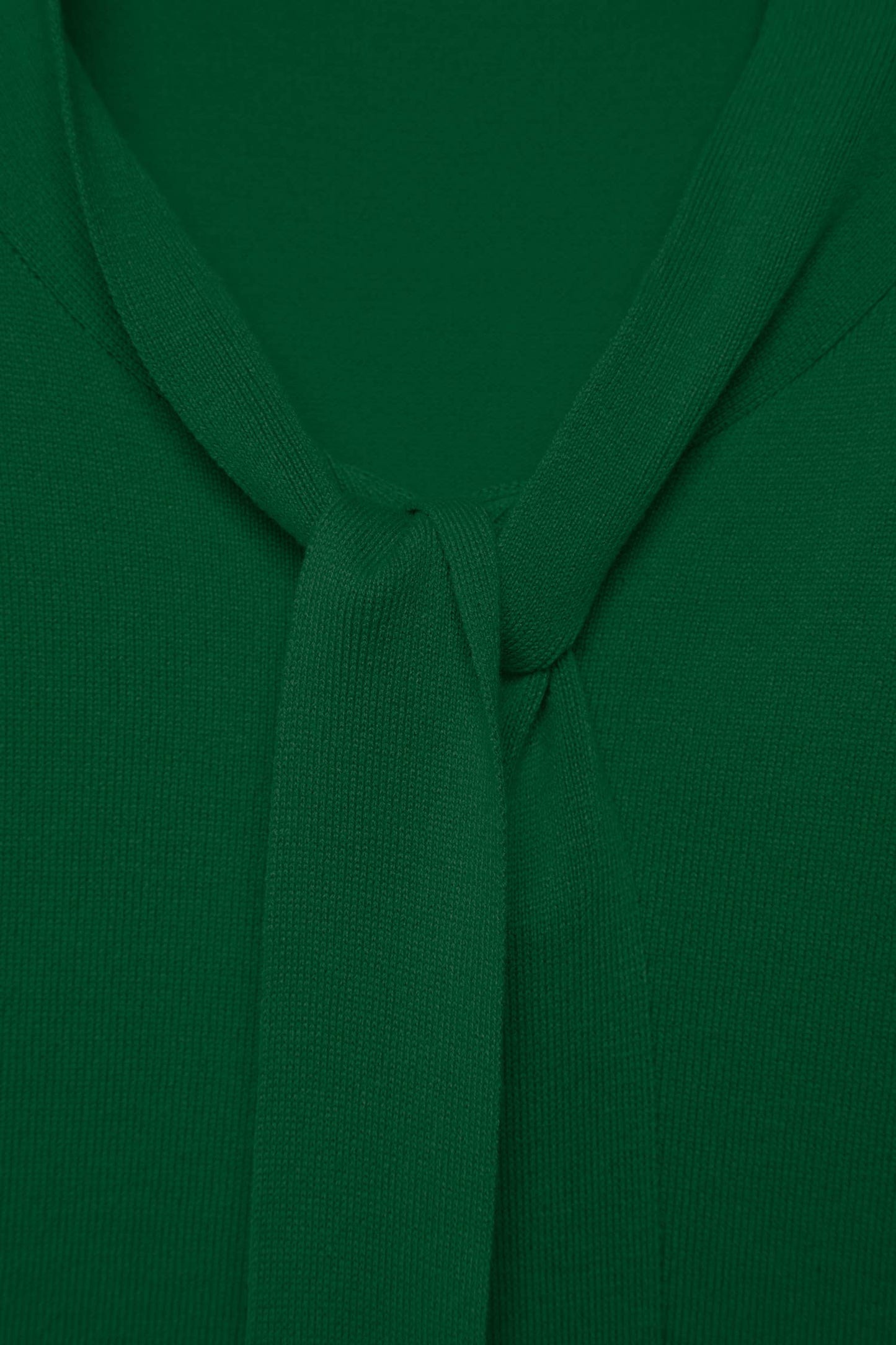 Maglione a maglia rasata con scollo a V e fiocco