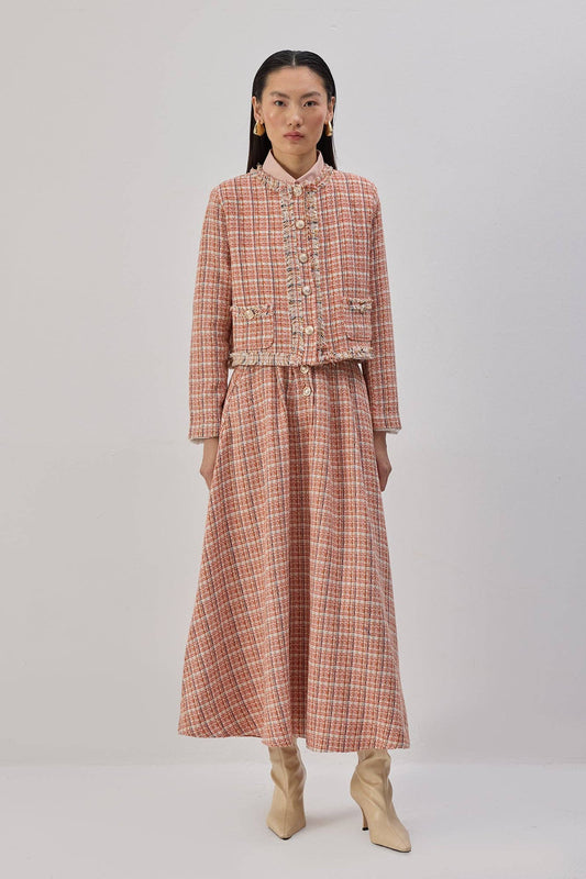 Completo in tweed con giacca corta e gonna lunga