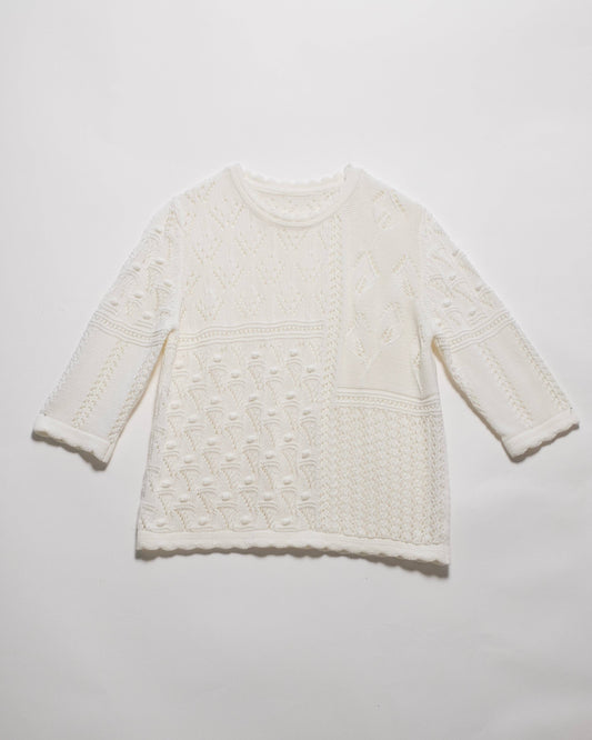 Maglia traforata in cotone con motivo floreale