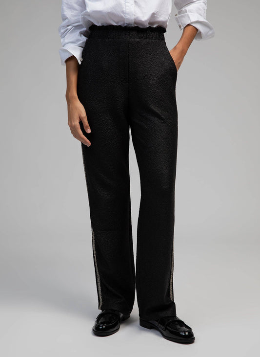 Pantaloni Pierroly effetto pelle neri con bande argento