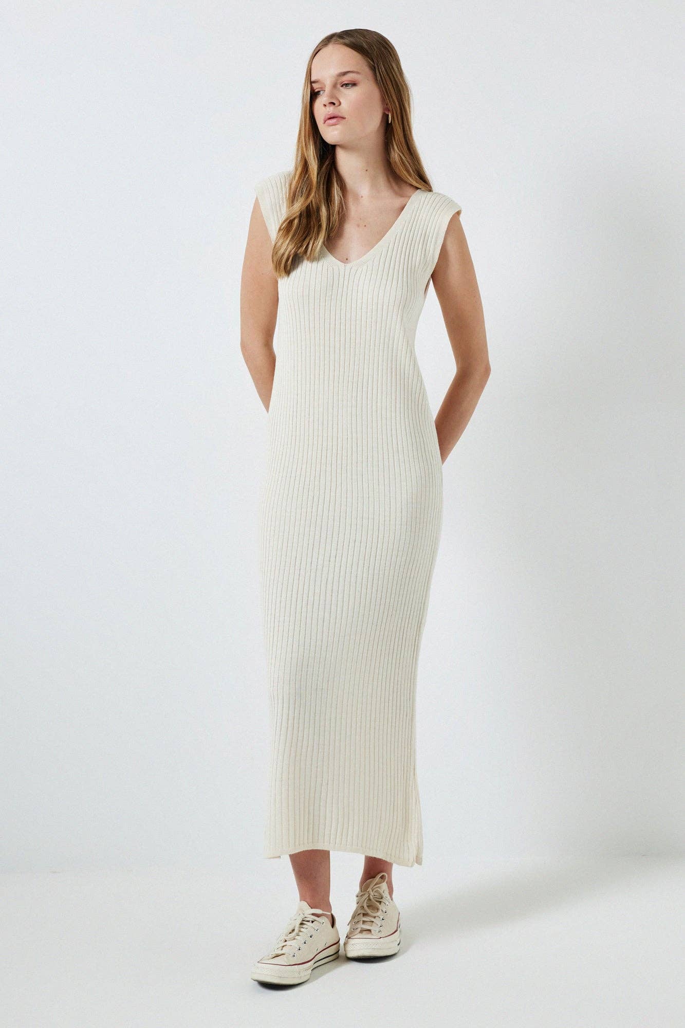 Set in maglia a righe con maxi maglione e abito longuette