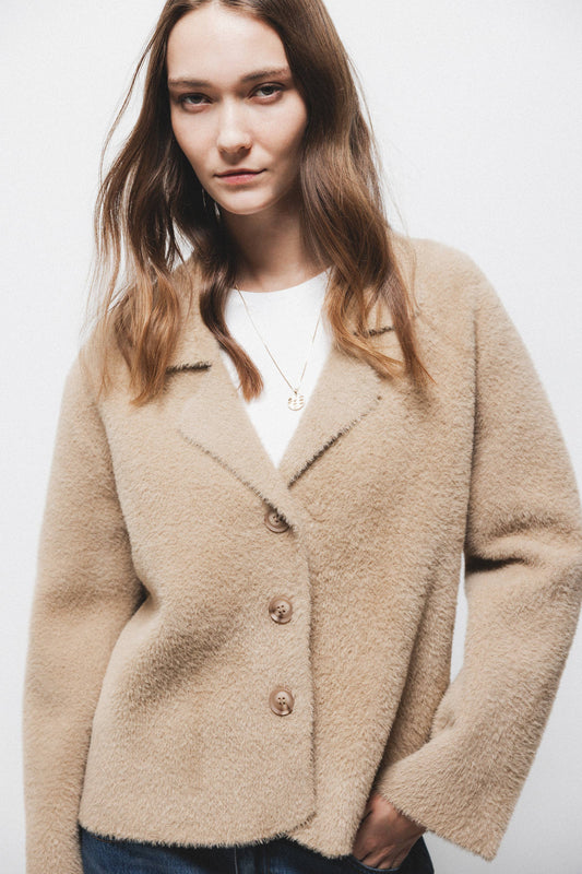 Cappotto corto in pelliccia sintetica beige