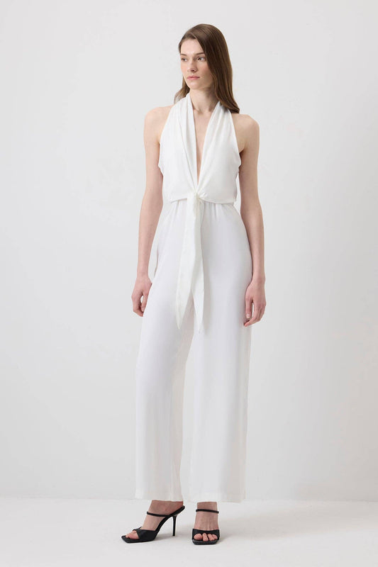 Tuta halter ecrù con fiocco frontale