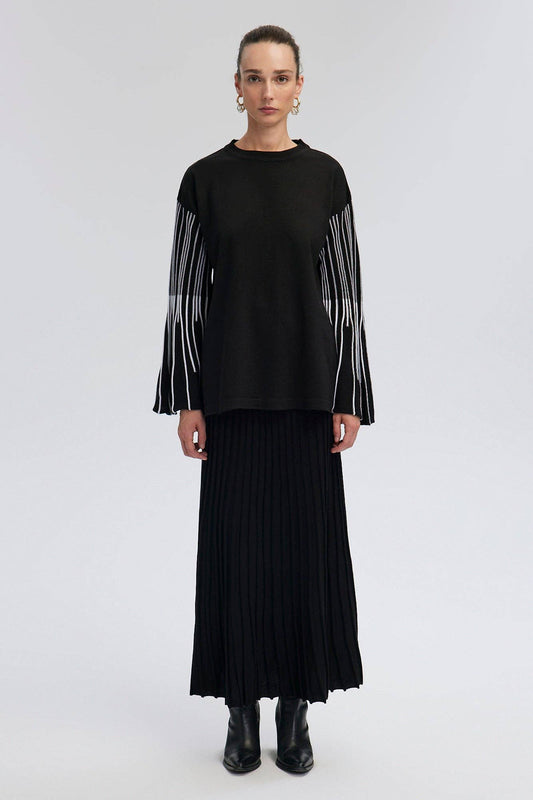 Completo in maglia con tunica e gonna plissé a righe