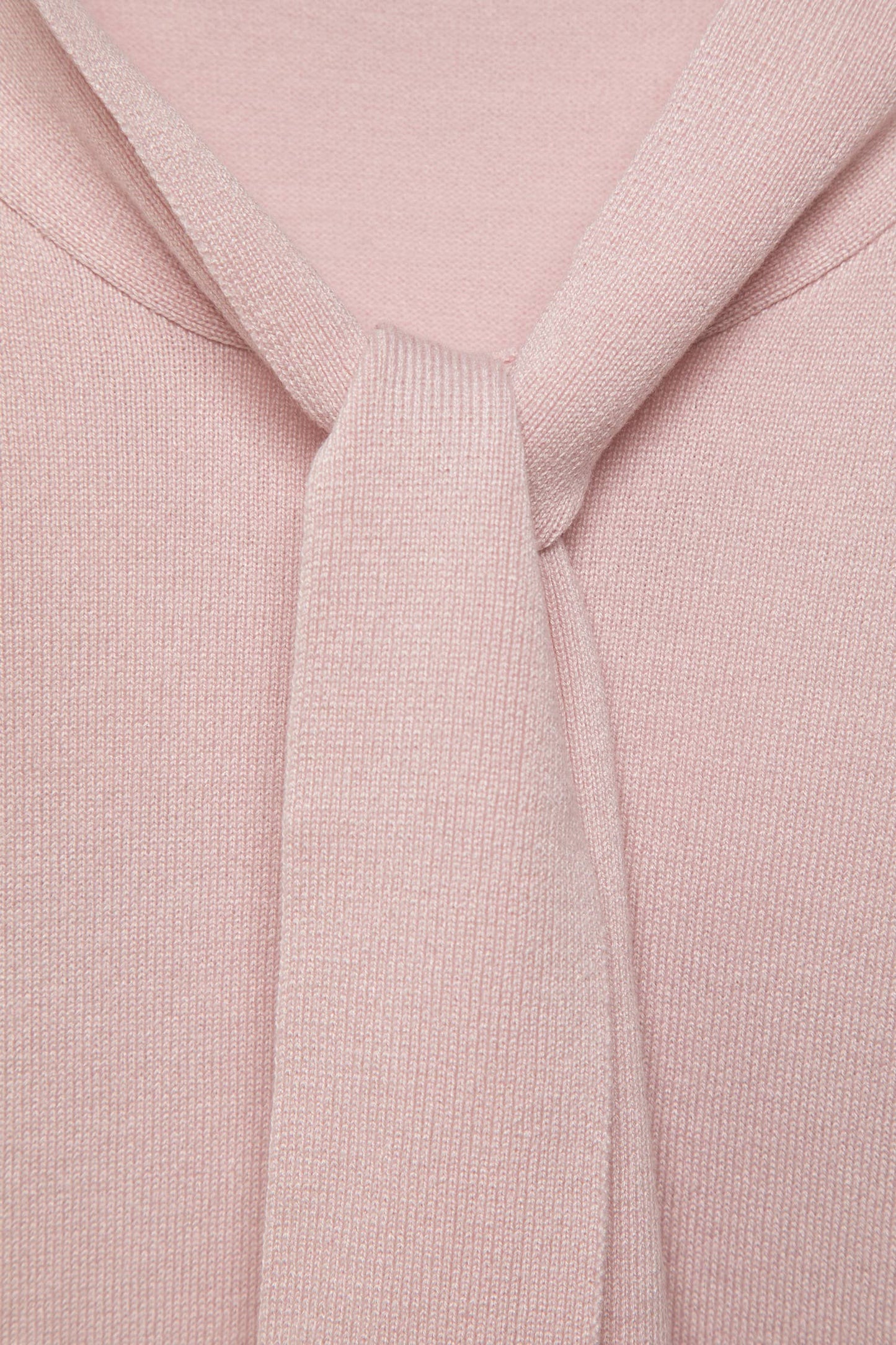 Maglione in maglia rasata con fiocco e scollo a V