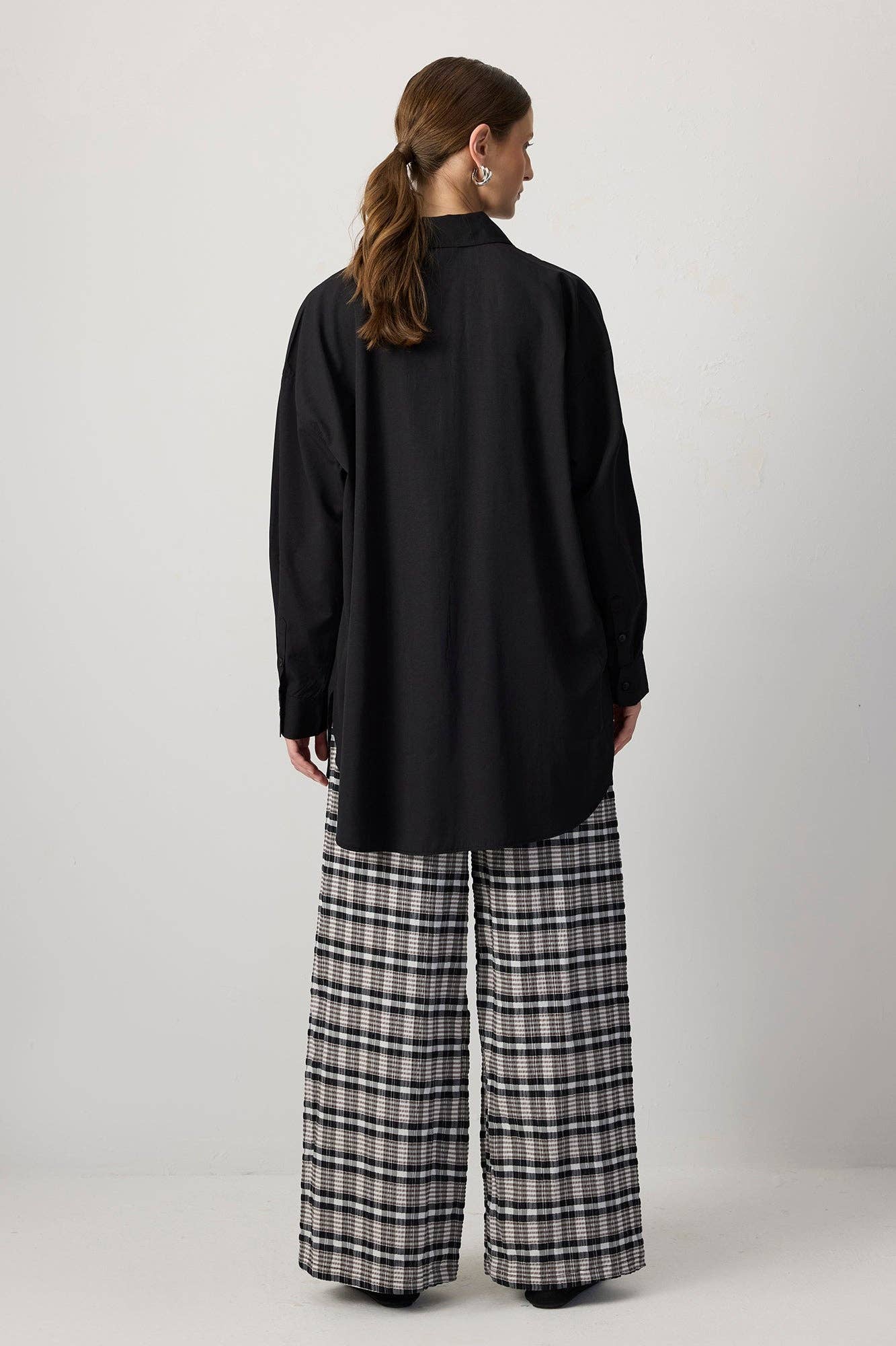 Pantaloni palazzo a quadri con vita elasticizzata