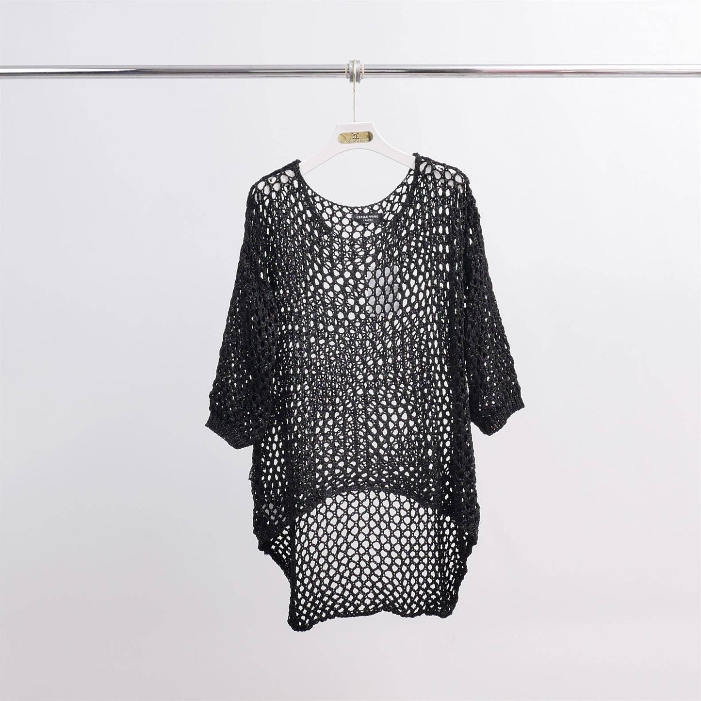 Maglione traforato all’uncinetto effetto lucido