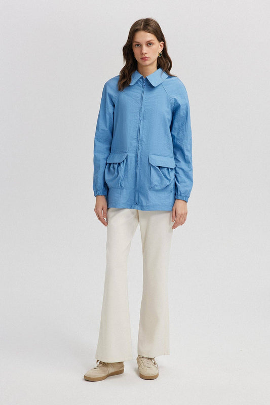 Impermeabile leggero con maxi tasche e zip