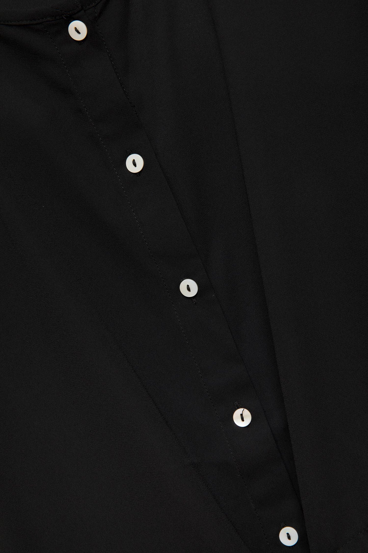 Blusa nera con coulisse in vita