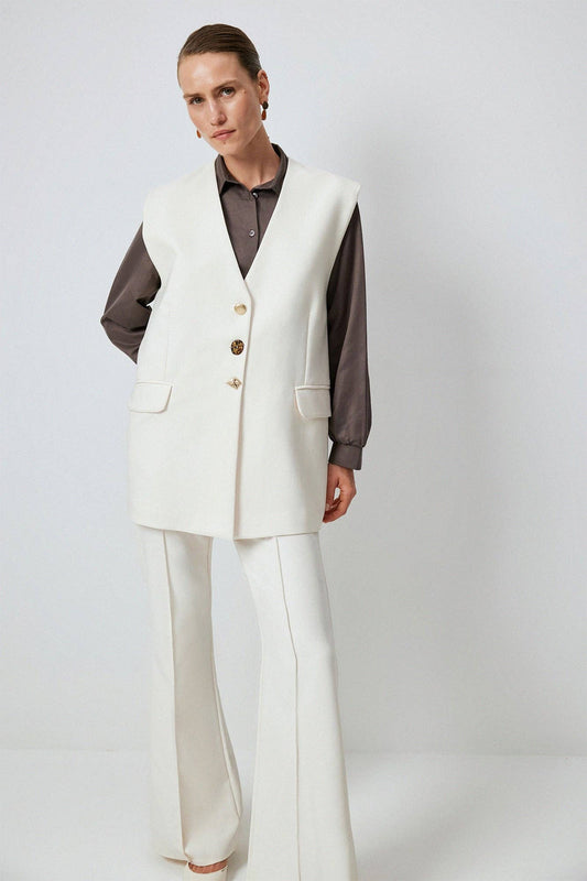 Gilet in crêpe con bottoni