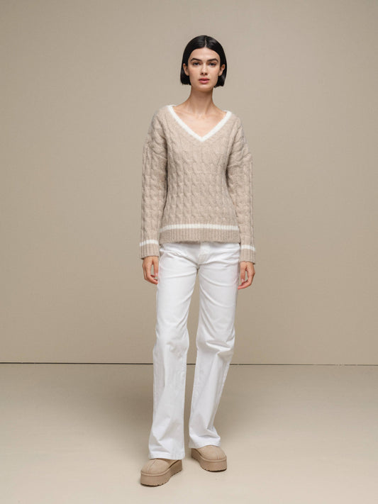 Maglione donna a trecce con scollo a V