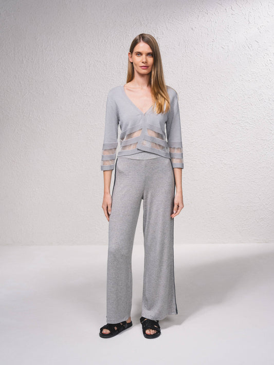 Giacca corta in maglia lurex con trasparenze